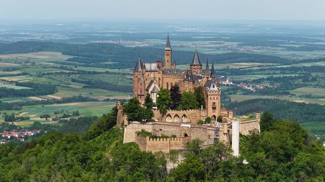 Hohenzollern Castle, located in Baden‑W&uuml;rttemberg in southern Germany, is a hilltop fortress known for its dramatic architecture, panoramic views, historic ramparts, royal heritage.