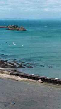 Cancale, located in the Ille-et-Vilaine department of the Brittany region in France, is a coastal town known for its oyster farms, scenic bay views and maritime heritage.