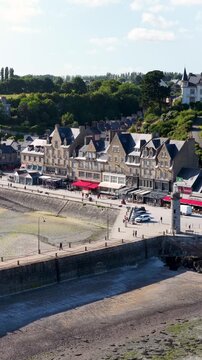Cancale, located in the Ille-et-Vilaine department of the Brittany region in France, is a coastal town known for its oyster farms, scenic bay views and maritime heritage.