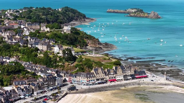 Cancale, located in the Ille-et-Vilaine department of the Brittany region in France, is a coastal town known for its oyster farms, scenic bay views and maritime heritage.