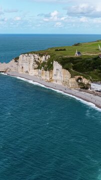 &Eacute;tretat in the Seine‑Maritime department of the Normandy region in France, is a dramatic coastal village known for its chalk cliffs, natural arches and sweeping views over the English Channel.
