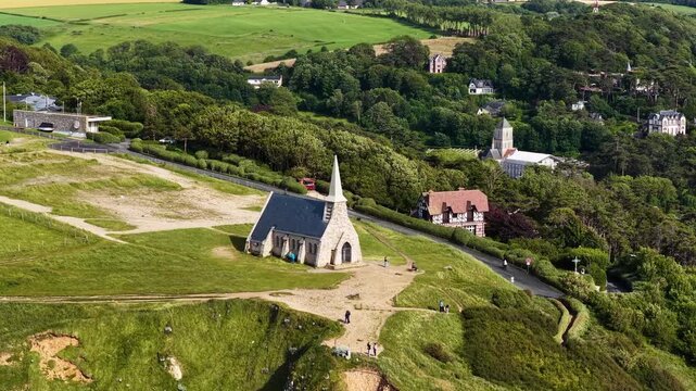 &Eacute;tretat in the Seine‑Maritime department of the Normandy region in France, is a dramatic coastal village known for its chalk cliffs, natural arches and sweeping views over the English Channel.
