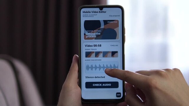Creator checks audio on a smartphone video editor as silence detection prepares the clip for cleanup, reflecting faster mobile workflows and efficient content production.