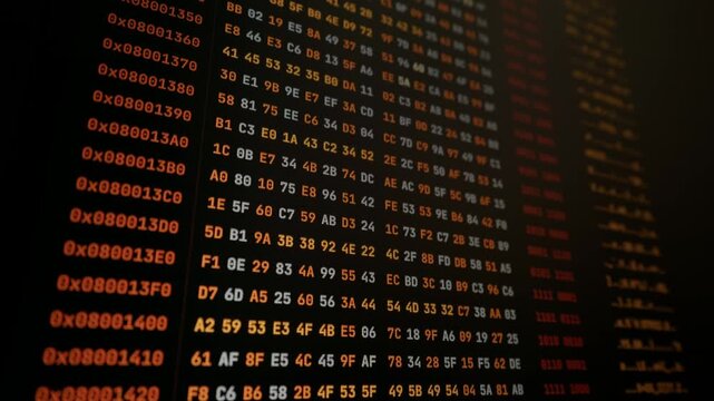 Hexadecimal code scrolls across an amber monitor in a dark room close-up. Glowing amber machine data cascades down the vintage screen, creating an authentic cyber security atmosphere.