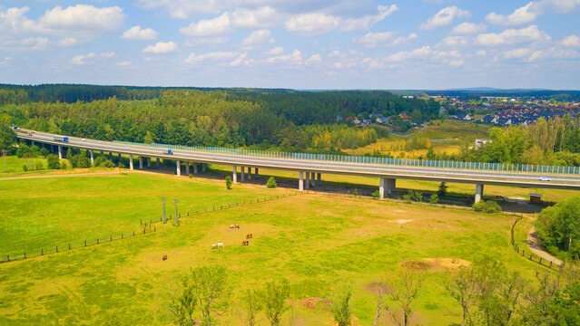 Aerial view of a highway bridge over the valley. D5 highway from Nuremberg to Prague in Czech republic, European union.