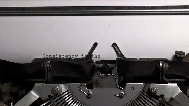 Vintage typewriter typing Consistency is the key to breakthrough quote footage