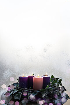 Scandinavian Advent wreath on table with copy space for Christmas text.
