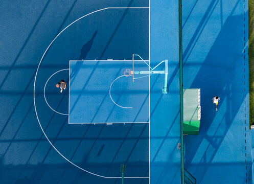 Aerial View of Basketball Court with Players