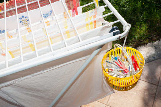 Laundry Drying Rack With Basket of Clothespins