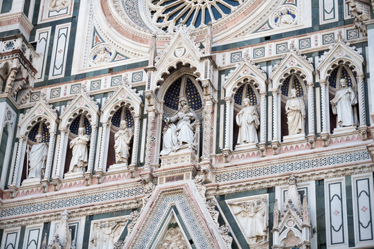 Fragment of facade Duomo Santa Maria del Fiore, Florence, Italy. Sculpture composition on facade Duomo Santa Maria del Fiore, Florence, Italy