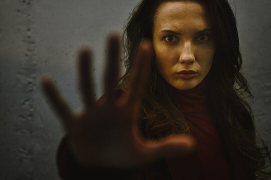 Woman with fragmented face expressing stress and depression