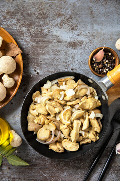 Sauteed mushroom and onion in skillet for home cooking