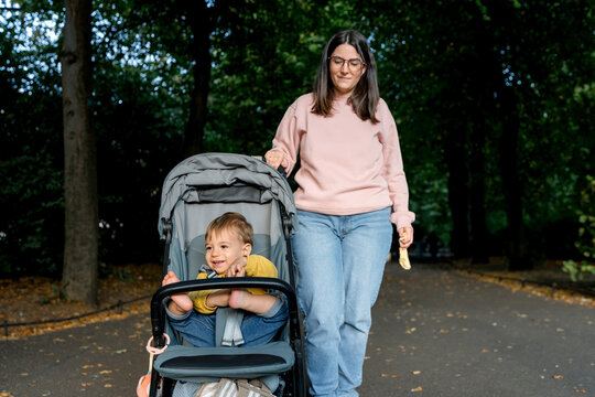 Mother push stroller with toddler in St Stephen's Green Park
