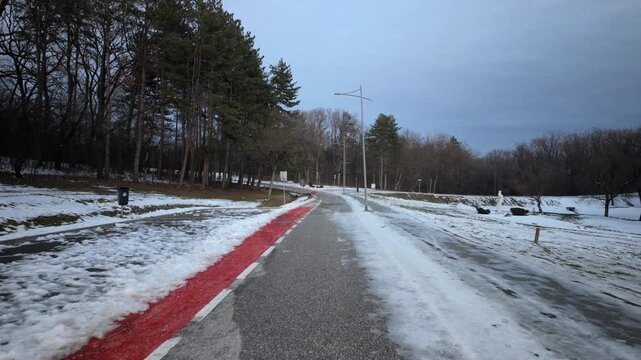 Snowy Park Path Red Bicycle Lane