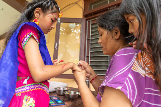 Hindu ceremony with young girl in traditional dress