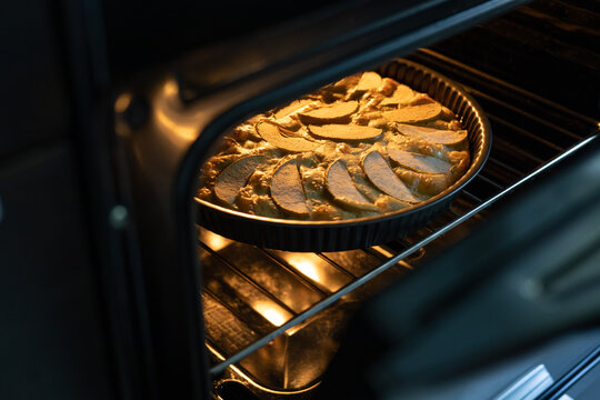 Homemade apple pie bake in oven for autumn dessert