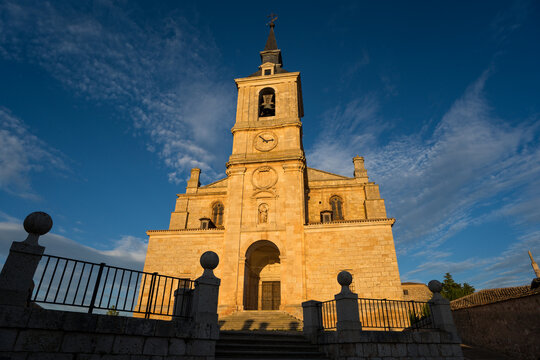 Historic church facade at sunset in Lerma, Burgos, Spain