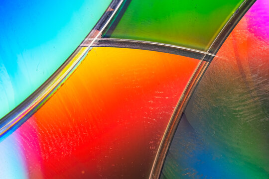 Colorful abstract cd surface with vivid rainbow reflections