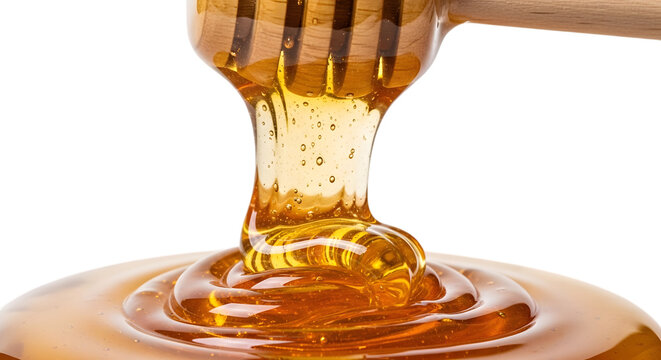 Golden honey dripping from a wooden dipper onto a pool of honey