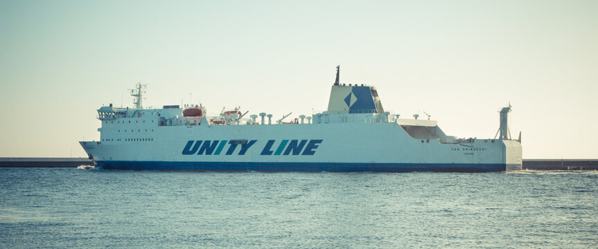 Swinoujscie, West Pomeranian - Poland - June 14, 2021: Jan Sniadecki ferry leaving port of Swinoujscie. Transport passengers and cars to Ystad