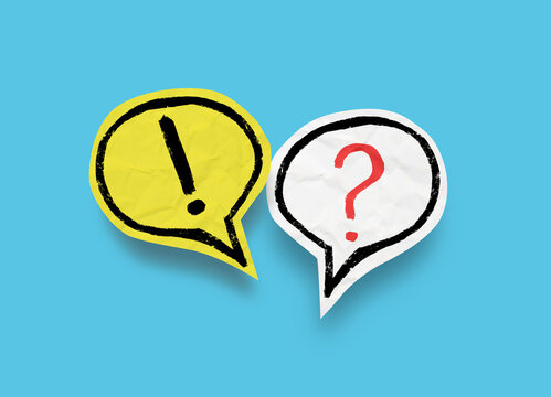 Textured yellow exclamation bubble and white question bubble with red punctuation, with paper surfaces and rough black outlines on a blue background.
