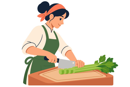 Woman slices fresh celery stalks on a cutting board while preparing food in profile with a green apron and coral headscarf