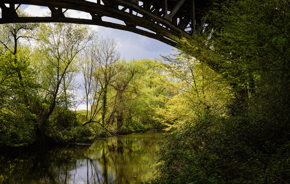 River flowing under old bridge structure in Witten