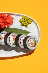 Assorted sushi rolls with salmon and vegetables © Влад Пентюк