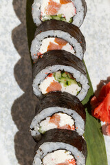 Salmon sushi rolls wrapped in nori seaweed © Влад Пентюк