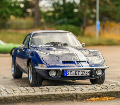 Trollh&auml;ttan, Sweden - August 22 2026: Classic blue Opel GT sports coupe after rainfall.
