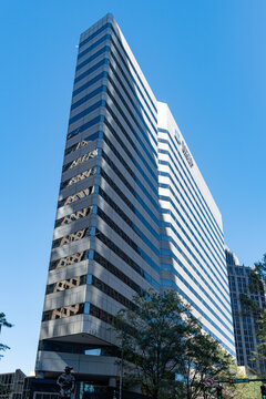 The Capital Group building at One Independence Center in Uptown Charlotte, NC on a Carolina blue sky day