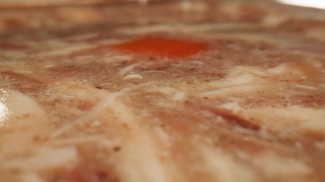 Meat aspic, slavic food, Traditional Russian pork meat aspic Kholodets with horseradish, mustard, jellied jelly beef, eating in restaurant chicken tasty dish. Close up on kitchen. 