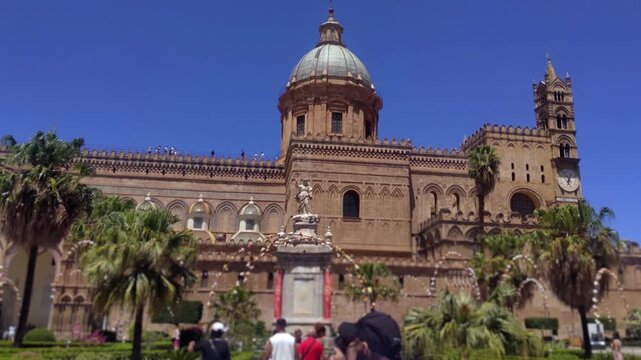 Pan Right View Of Palermo Cathedral Exterior Facade With Dome And Tourists In Sicily Italy