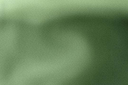 Minimalistic abstract green background for product presentation with aesthetic light and shadows