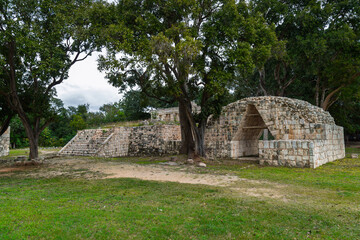 Wide view of the Casa Colorada (Red House) complex showing vaulted structure and platform with stairs at Chichen Itza, Mexico © simonmayer