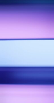 Rainbow of ethereal lights illuminate the brilliance of a smooth reflective glass prism. Colorful light refraction creating an aura of vivid saturated colors for a dreamy abstract background. Loop.