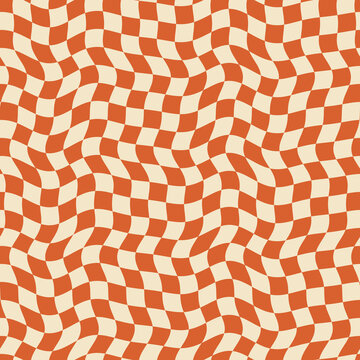 Seamless groovy wavy checkerboard pattern in cream and burnt orange, retro 70s style