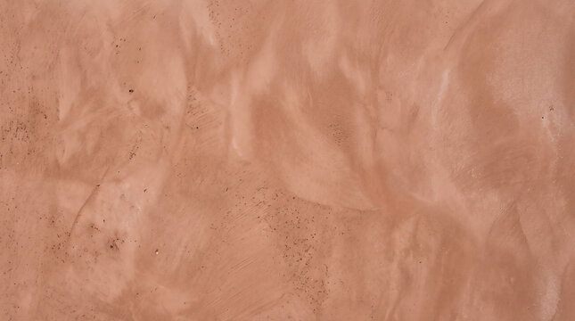 Terracotta clay plaster texture with soft brush strokes and natural variations