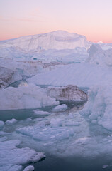 Icebergs from glacier in arctic nature landscape on Greenland. © Maridav