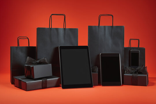 Mobile Phones, Tablets, and Laptops on Sale on Black Friday with digital gadgets and black gift packaging on red background