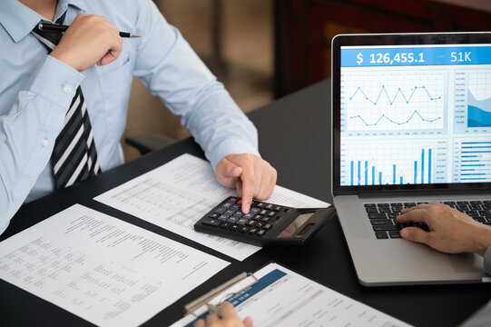 Finance team and Investment consultant analyze data insight and financial planning strategy for investment portfolio stock market growth.