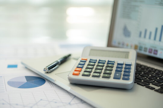 calculator and financial reporting of analyze data insight and financial planning strategy for investment portfolio growth.	