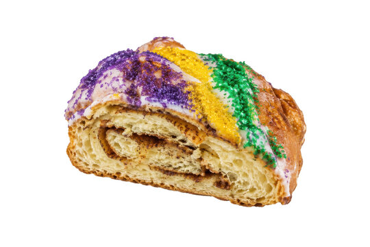 Delicious freshly baked Mardi Gras king cake slice with colorful sprinkles and sweet icing on a white background