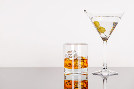 Whiskey and martini drinks with copy space