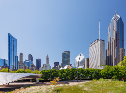 Vibrant sunny view of Chicago downtown skyline under a blue sky