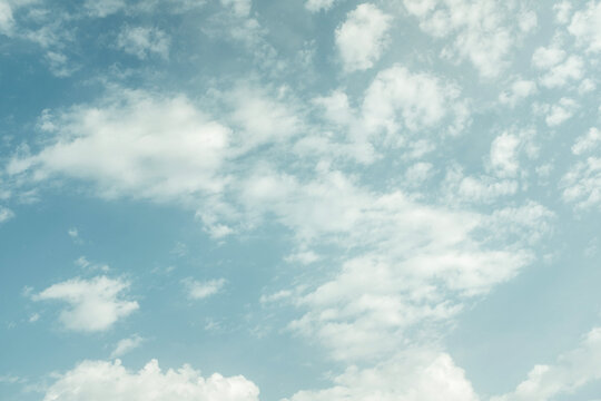 White puffy clouds against blue sky