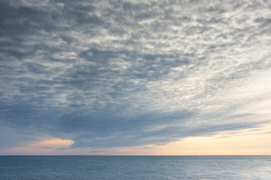 Evening sky and calm sea horizon