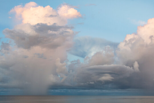 Storm clouds over calm Gulf of Mexico