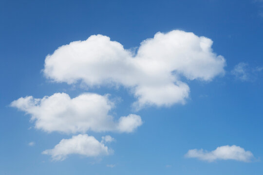 Fair weather cumulus clouds in blue sky