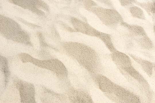 Close-up of footprints in beach sand